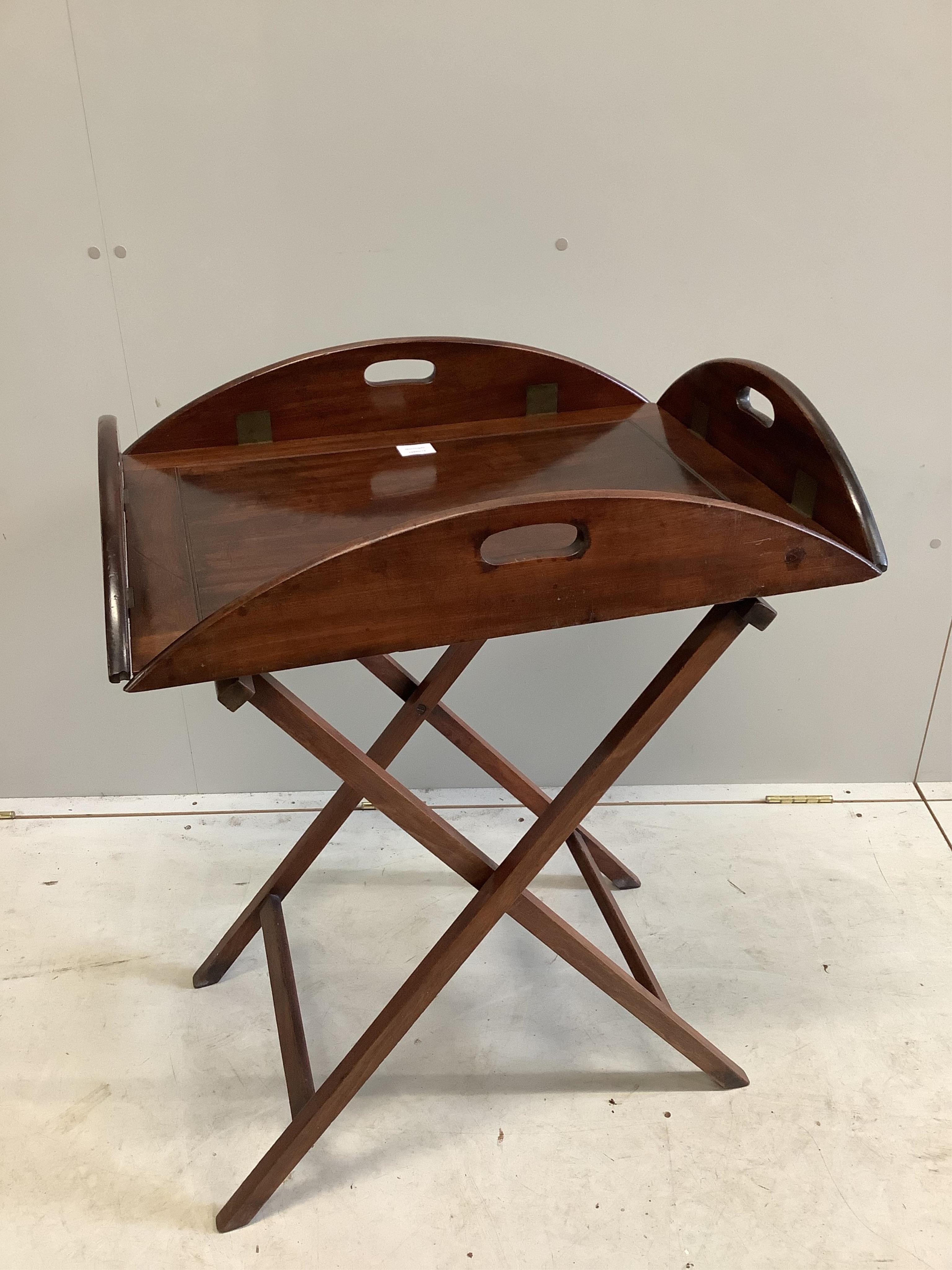 A Victorian mahogany butler’s tray on folding stand, width 70cm, depth 52cm, height 85cm. Condition - fair to good